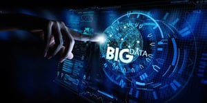 Hand interacting with digital interface displaying Big Data network.