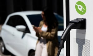 EV charging connector plugged into a charging station