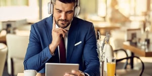 Sales manager using tablet during international travel